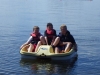 kid's in a peddle boat